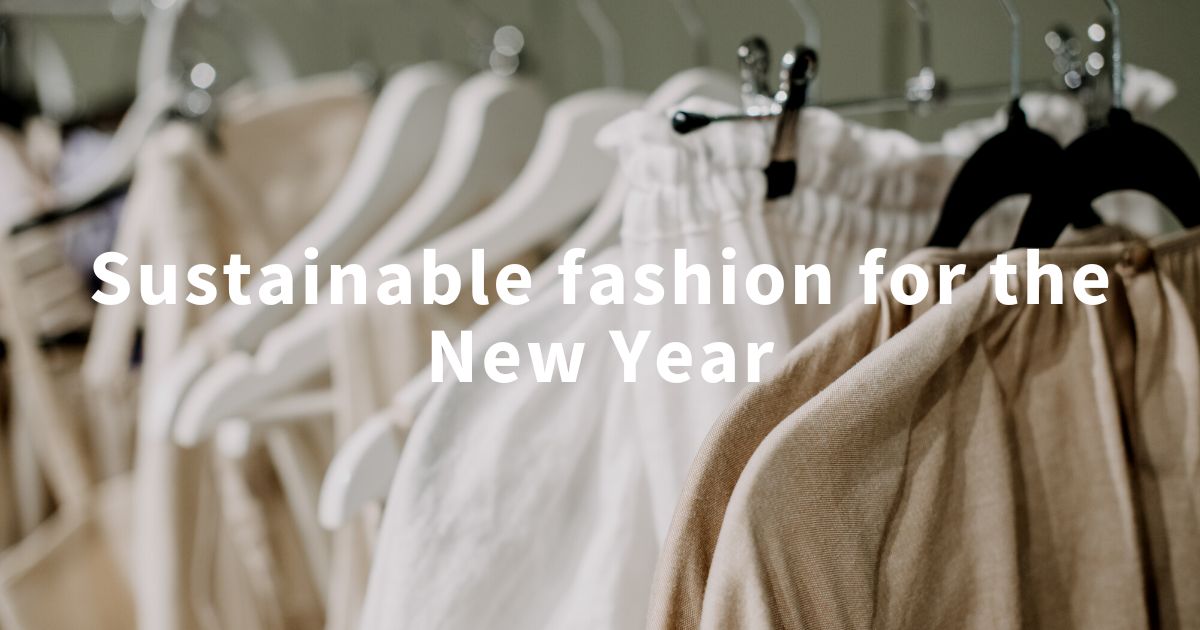 A railing of clothing with text that reads 'Sustainable fashion for the New Year'. This is the banner for the blog piece
