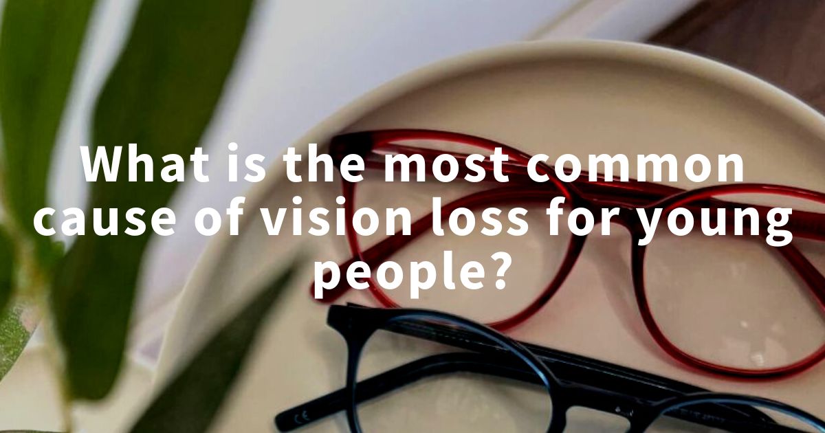 Glasses on decorative background with text that reads 'What is the most common cause of vision loss for young people?'