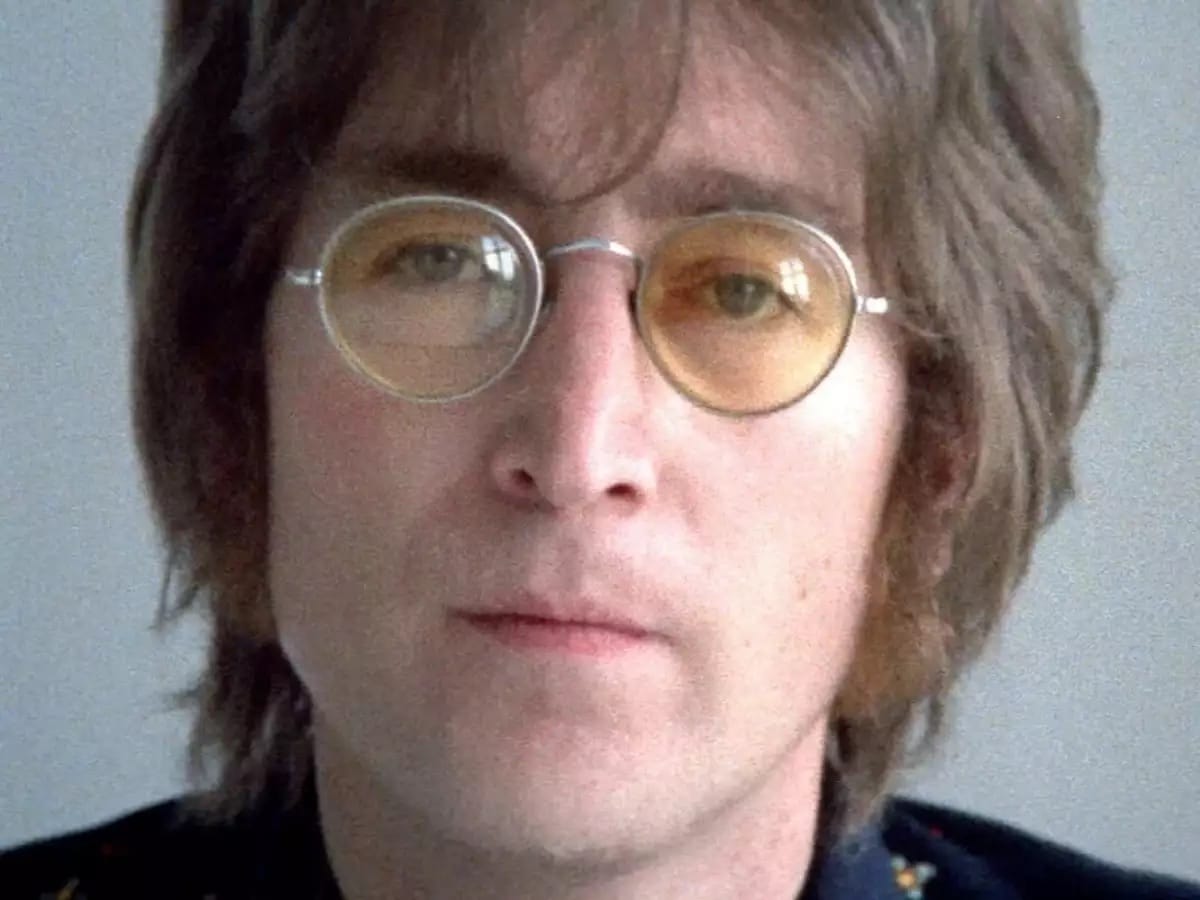 Image of John Lennon wearing his iconic glasses